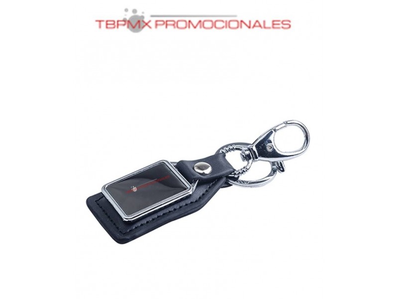 Llavero metalico curpiel orillas bordadas placa metalica drako promocional